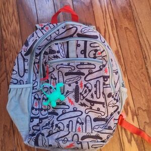 Gray and Red Kids Skateboard Backpack with Dinosaur Hand Sanitizer Charm